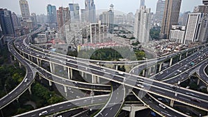 Aerial View of Shanghai Skyline,Heavy traffic on Shanghai highway interchange.