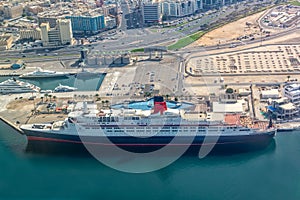 Aerial view of ship Queen ELizabeth 2 in the port of Dubai, UAE