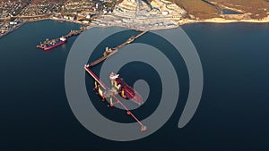 Aerial view, ships during loading and unloading at sea trade port