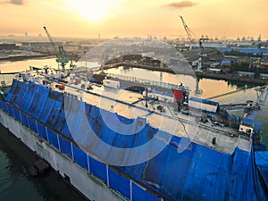 Aerial view shipyard have crane machine and container ship in gr