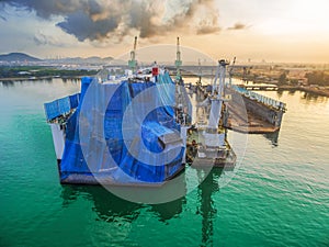 Aerial view shipyard have crane machine and container ship in gr