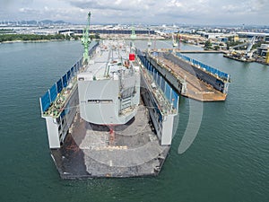 Aerial view shipyard have crane machine and container ship in gr