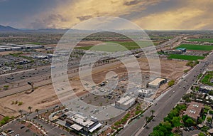 Aerial view of shopping district center and parking lot in Avondale small town a view overlooking desert near on of state capital photo