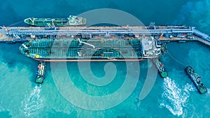 Aerial view shot of crude oil tanker ship anchored at the oil te