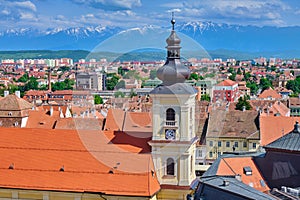 Aerial view of Sibiu city center with imposing tower of Holy Trinity Roman Catholic Church/Biserica Romano-Catolica Sfanta Treime