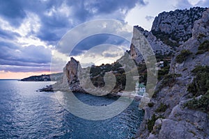 Aerial view of Simeiz village, Cat mountain in evening sunset light, Crimea. Black Sea