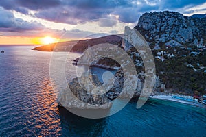 Aerial view of Simeiz village, Diva rock in sunset light. Cat mountain in background, Crimea. Black Sea