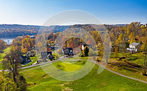 Aerial view of single family homes in a golf community in the fall outside Morgantown in West Virginia