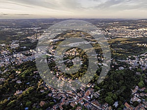 Aerial view of Sintra small town with scattered residential town on mountain landscape at sunset, Sintra, Lisbon, Portugal