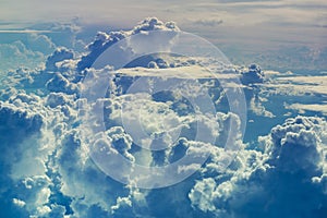 Aerial view through sky above the clouds abstract background.