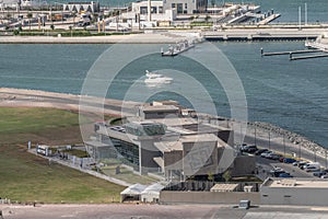 Aerial view of Skydive Dubai Palm Drop main control tower and terminal building near JBR Beach and The Palm