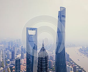 Aerial view of skyscraper and high-rise office buildings in Shanghai Downtown, China. Financial district and business centers in