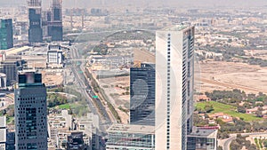 Aerial view of skyscrapers under construction in Dubai timelapse.