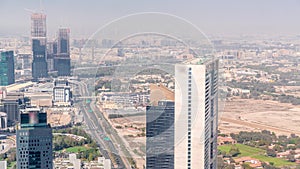 Aerial view of skyscrapers under construction in Dubai timelapse.