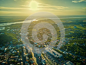 Aerial view of Slatina city at sunset, Romania. Drone flight over the european city at sunset