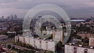 Aerial view of the sleeping district of Moscow against the background of the business center and the Dynamo stadium