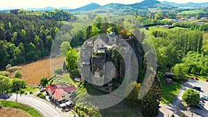 Aerial view of Sloup Castle in Northern Bohemia, Czechia. Sloup rock castle in the small town of Sloup v Cechach, in the Liberec