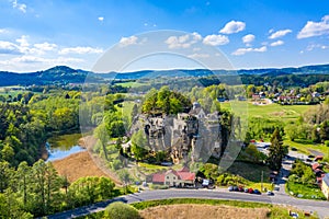 Aerial view of Sloup Castle in Northern Bohemia, Czechia. Sloup rock castle in the small town of Sloup v Cechach, in the Liberec