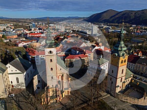 Aerial view of churches and Barbakan in Banska Bystrica during winter photo