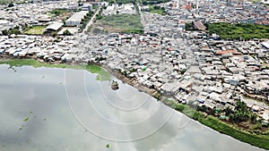 Aerial view of slum neighborhood on lakeside