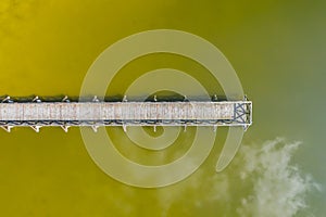 Aerial view of a smal wooden dock on a lake