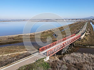 Aerial view of Small bridge on Otay River next to San Diego Bay National Refuger in Imperial Beach, San Diego