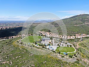 Aerial view of small community park in middle class neighborhood in the valley during sunny day