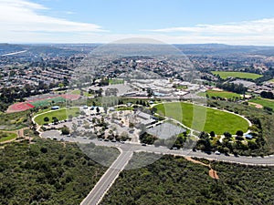 Aerial view of small community park in middle class neighborhood in the valley during sunny day