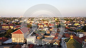 Aerial view of small crowded city in the afternoon