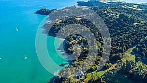 Aerial view on a small harbour at sunset. Waiheke Island, Auckland, New Zealand.