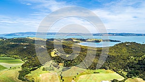 Aerial view on small houses at sunny day. Waiheke Island, Auckland, New Zealand.