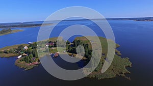 Aerial view of a small inhabited island on beautiful lake Seliger, Russia