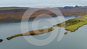 Aerial view of a small island in a fjor in Iceland.