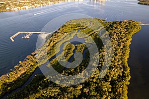 Aerial view of a small island surrounded by waters in North Palm Beach, Florida