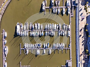 Aerial view of a small pier with speedboats and sailing boats docket at Marina harbour in Lisbon downtown, Oriente, Lisbbon,