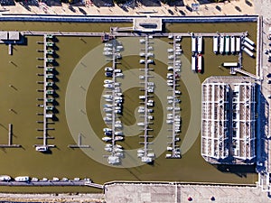 Aerial view of a small pier with speedboats and sailing boats docket at Marina harbour in Lisbon downtown, Oriente, Lisbbon,