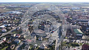 Aerial view of small Polish town of Sroda Wielkopolska on spring day, Greater Poland Province