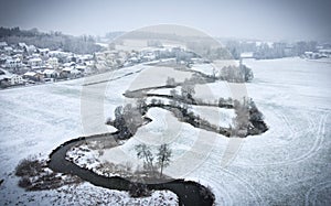 Aerial view of a small river in winter