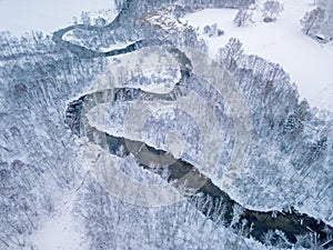 Aerial view of small river in winter day