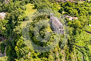 Aerial View of Small Stone Church of Saint Veronica on Rocca of CaldÃÂ¨, Castelveccana in the province of Varese, Italy photo
