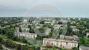 Aerial View of a Small Town, Urban landscape, Flying by Houses near Green Spaces