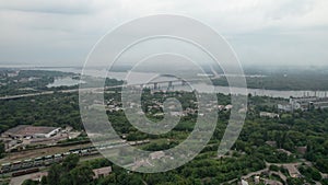 Aerial View of a Small Town, Urban landscape, Flying by Houses near Green Spaces