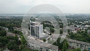 Aerial View of a Small Town, Urban landscape, Flying by Houses near Green Spaces