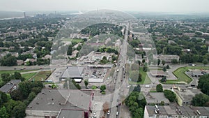 Aerial View of a Small Town, Urban landscape, Flying by Houses near Green Spaces
