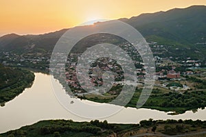 Aerial view of the small town and view of the merger of two rivers