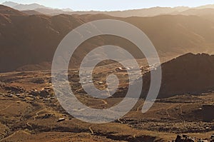 Aerial view of small village in the valley between high mountains. View from Mount Sinai Mount Horeb, Gabal Musa photo