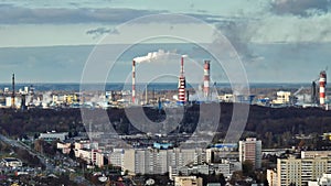 aerial view on smoked pipes of chemical enterprise plant. Air pollution concept.