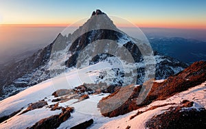 Aerial view of snow beautiful mountain landscape. Sunset time