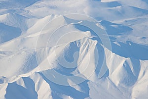 Aerial view of snow-capped mountains.