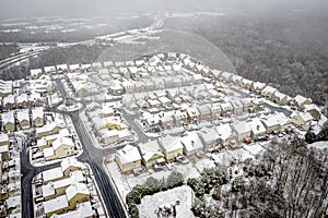 Aerial view snow covered houses in Atlanta Georgia suburbs